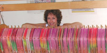 Kathrin
                  Weber at her six-foot loom